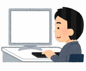 PCで作業する男性