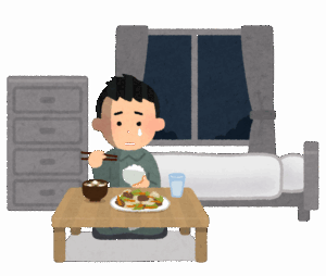 食事する男性