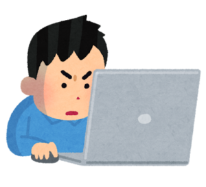 パソコンに熱中する男性